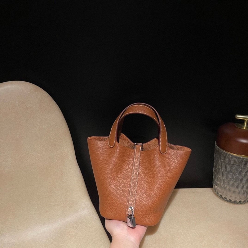H**mes shopping bags